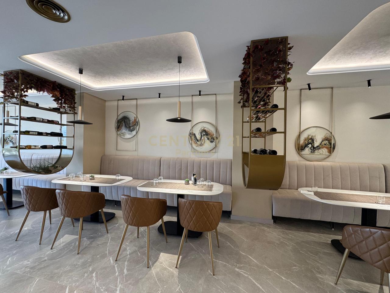 SHE'S A BAR-RESTAURANT IN QERRET!
