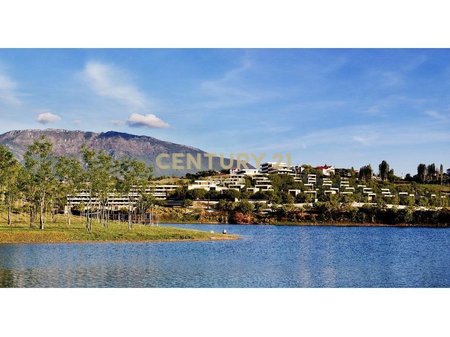 1+1 apartment with balcony and lake view in the Farka Lake Front residence.