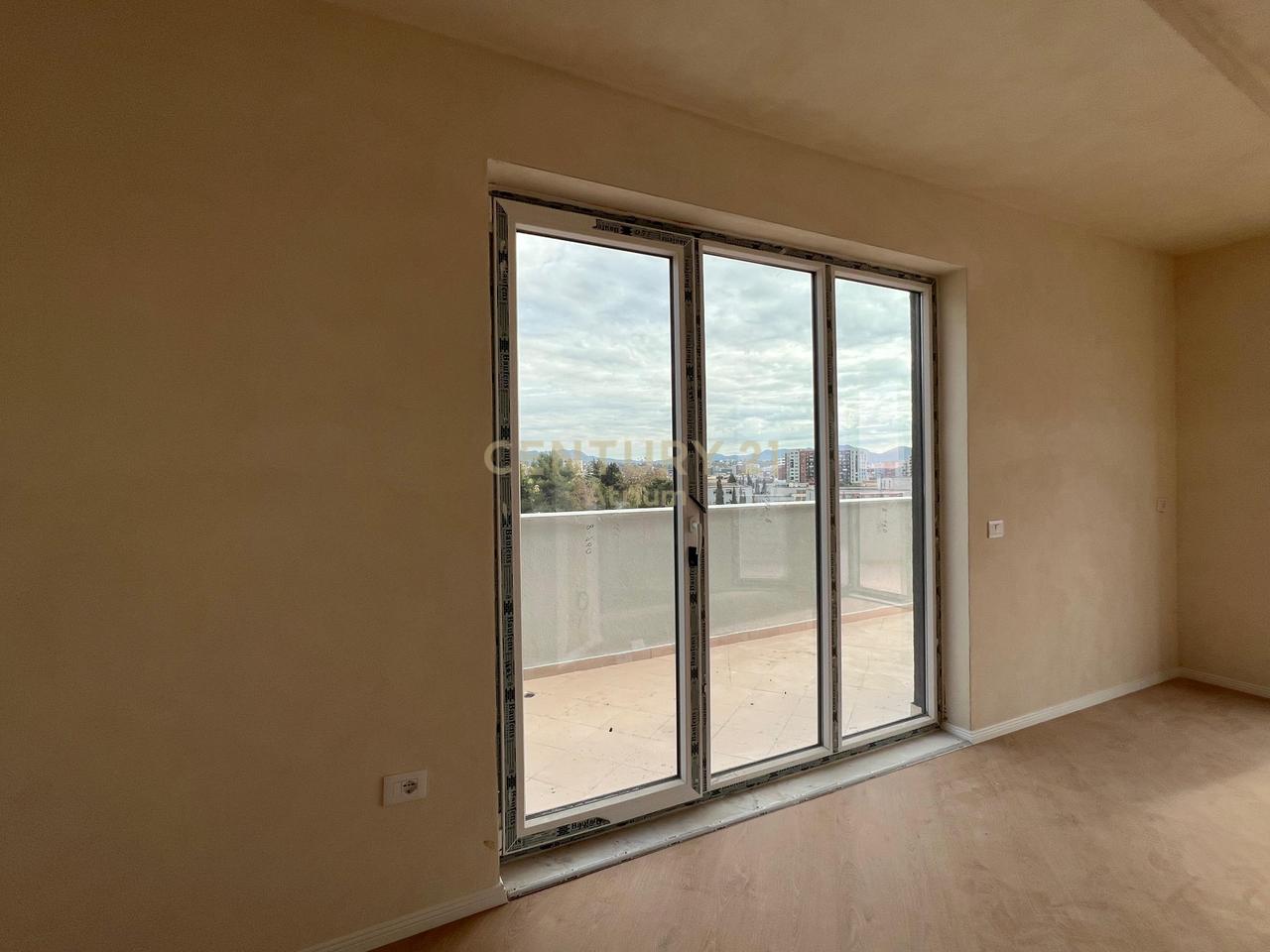 APARTMENT 2+1 WITH VERANDA FOR SALE NEAR UNITED SCHOOL