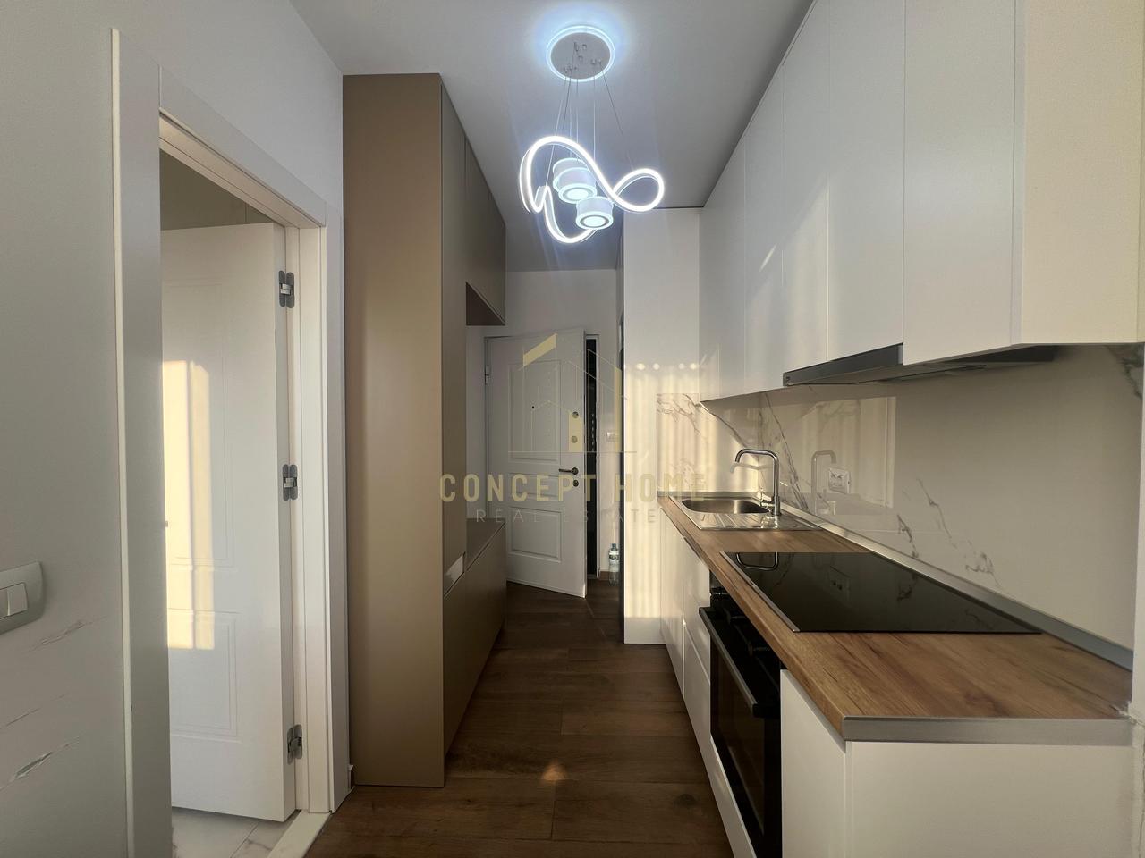 A studio apartment is for rent opposite the "Deshmoret e Lirise" school.