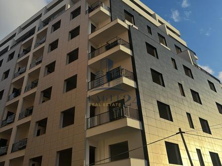 2+1+2 apartment for sale at "SPACE CITY" in Paskuqan, direct exit to the Grand Ring, with a price of €140,000