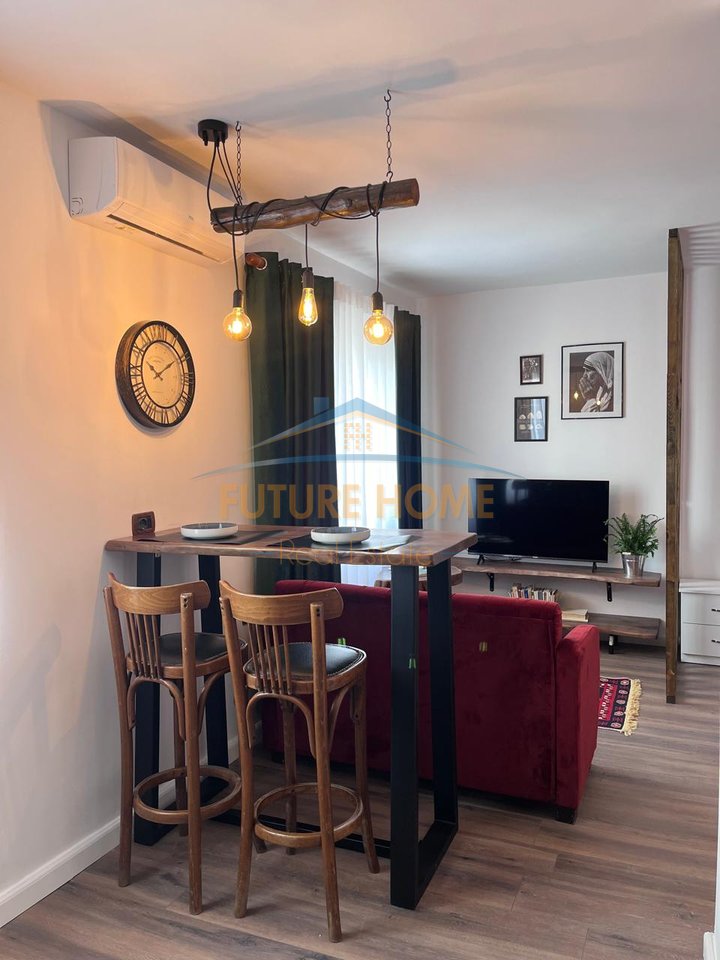 Qira, Garsoniere, 21 Dhjetori