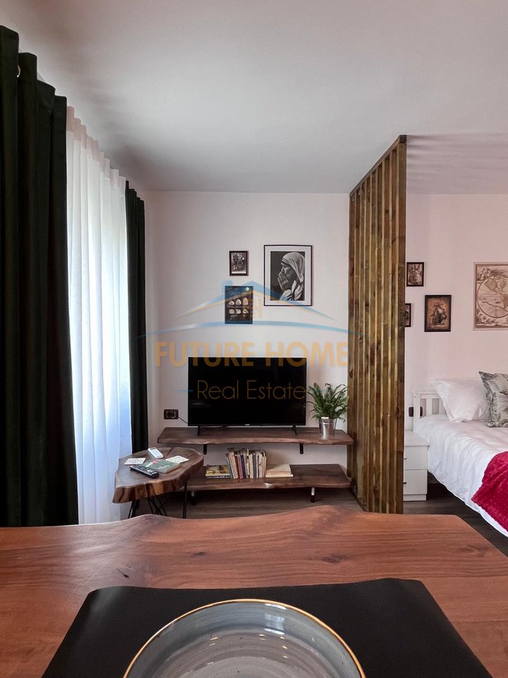 Qira, Garsoniere, 21 Dhjetori