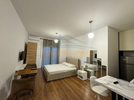 Qira, Garsoniere, Kodra e Diellit, Tiranë