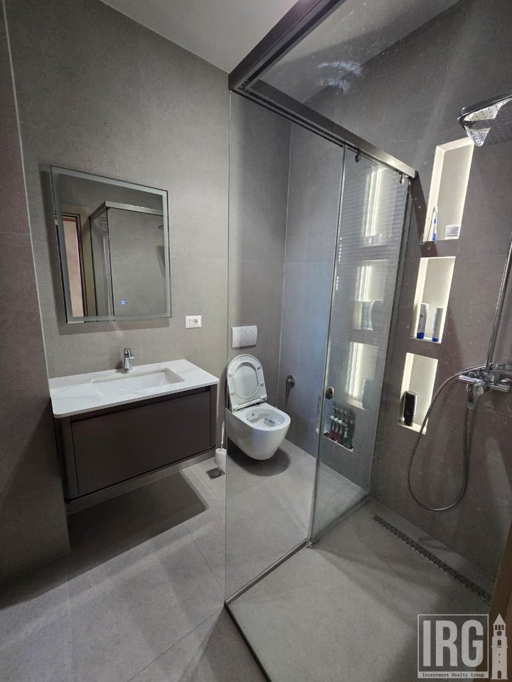 SHITET APARTAMENT 3+1 I KONVERTUAR NË 2+1 + POST PARKIMI – GARDEN BUILDING, KATI 13