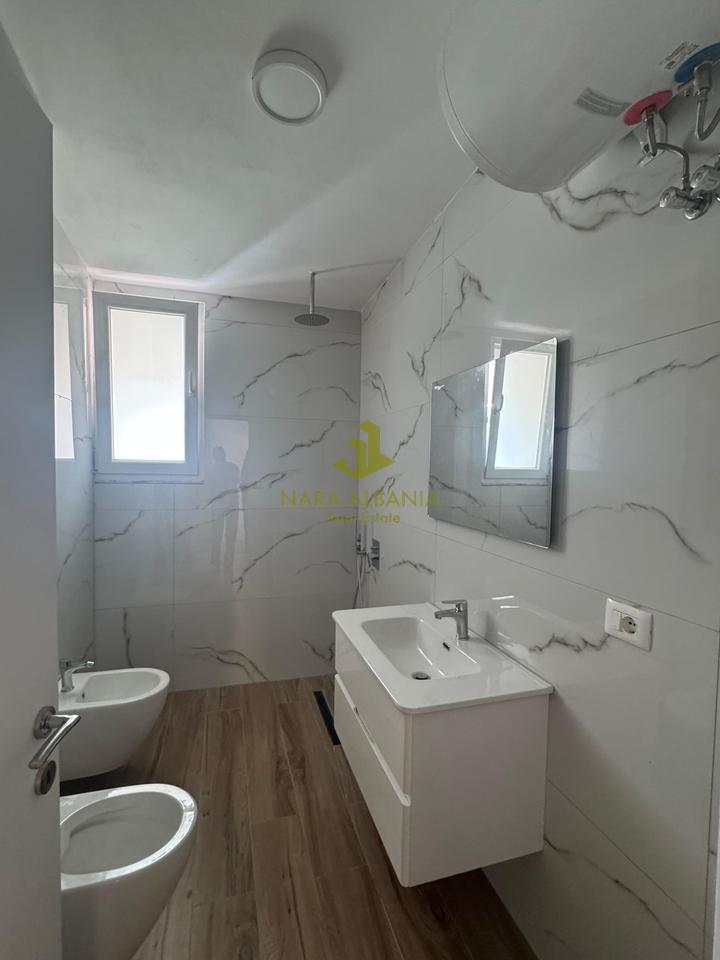 1+1 apartment, near the Shkoza overpass, on Islam Rusi Street.